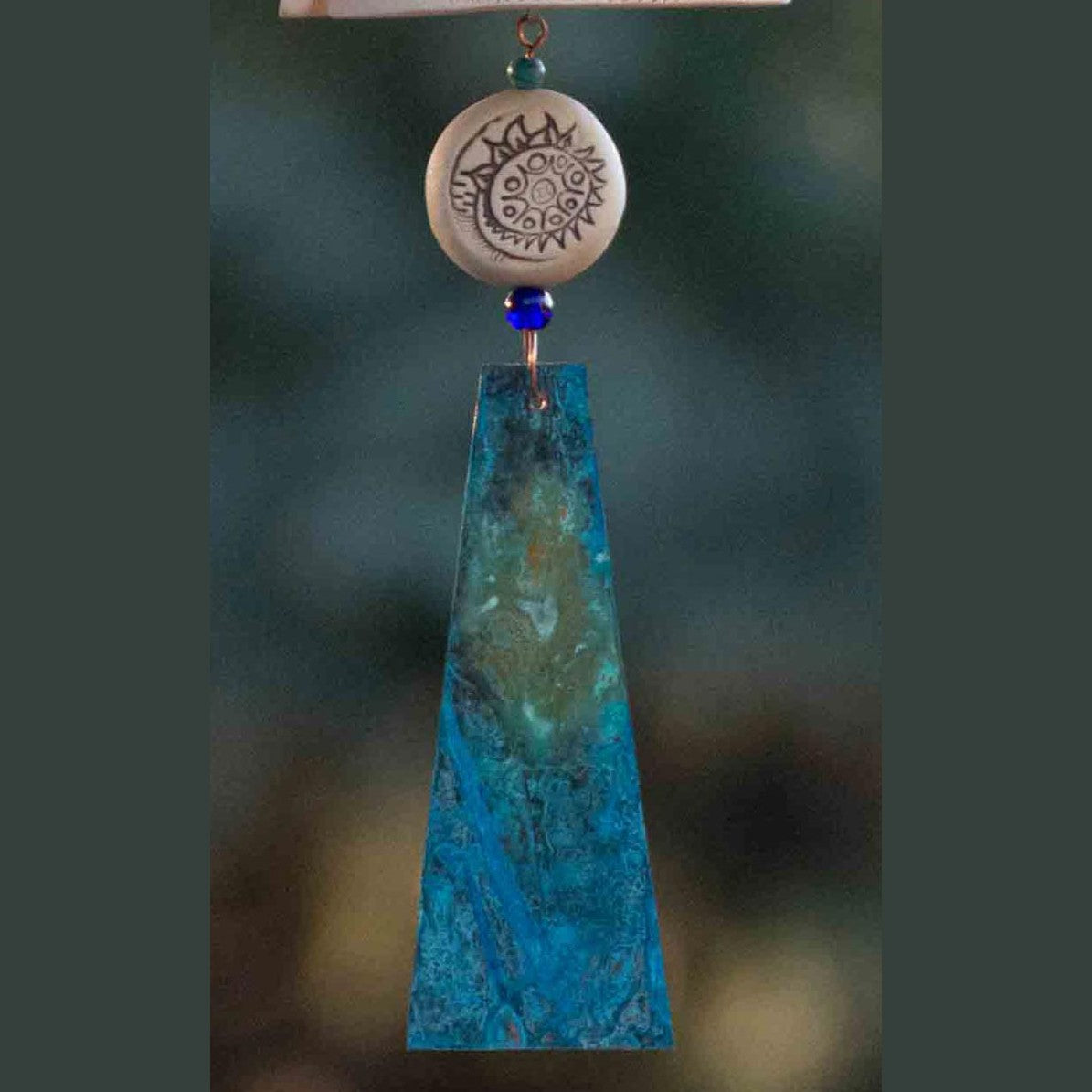 Elegant outdoor ceramic wind chime symbolizing love and strength