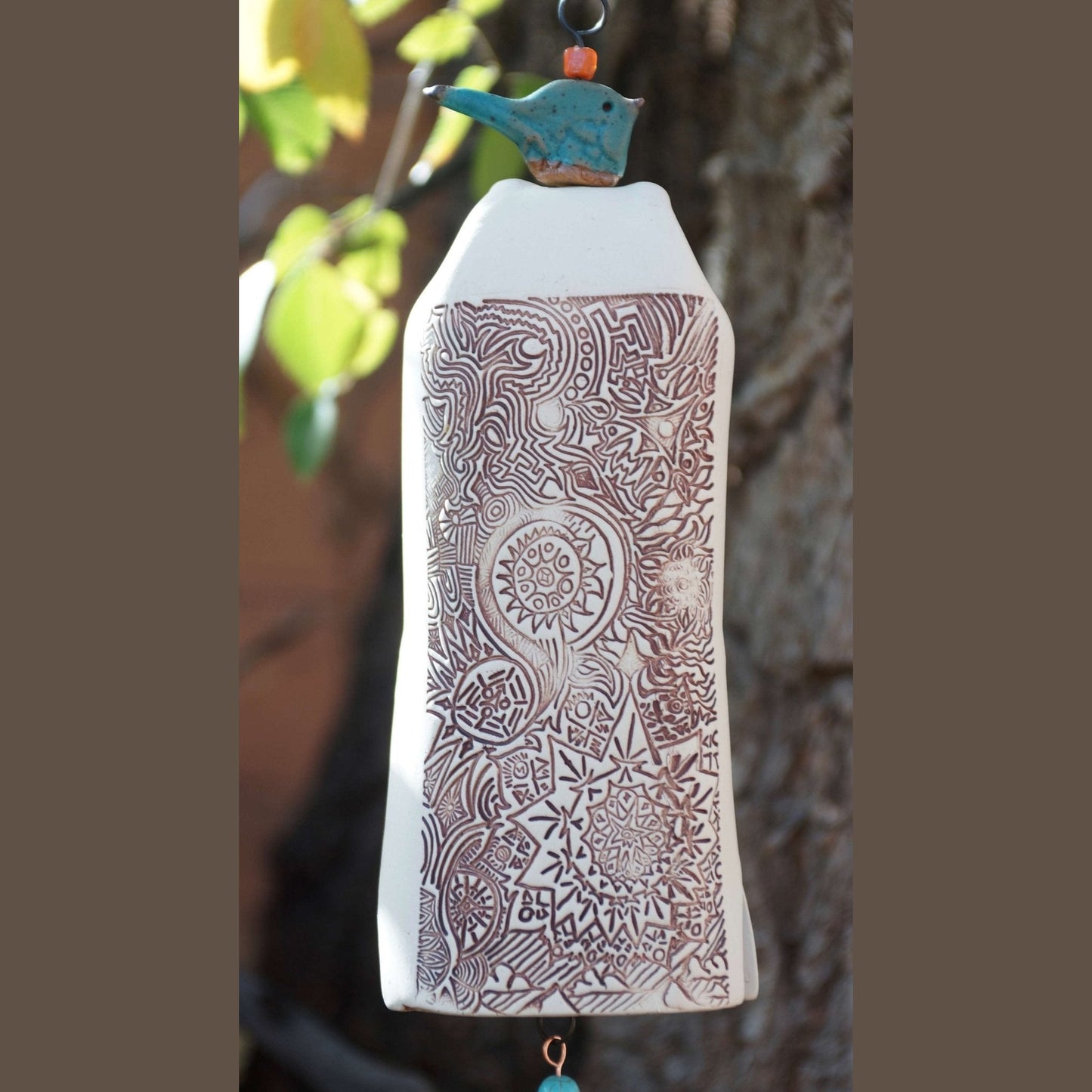 White Starburst memorial wind chime – handmade ceramic sympathy gift by EarthWind Bells