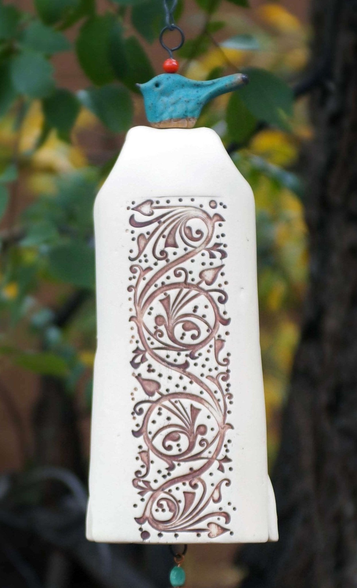 White Vines wind chime with blue bird topper, engraved welcome sail