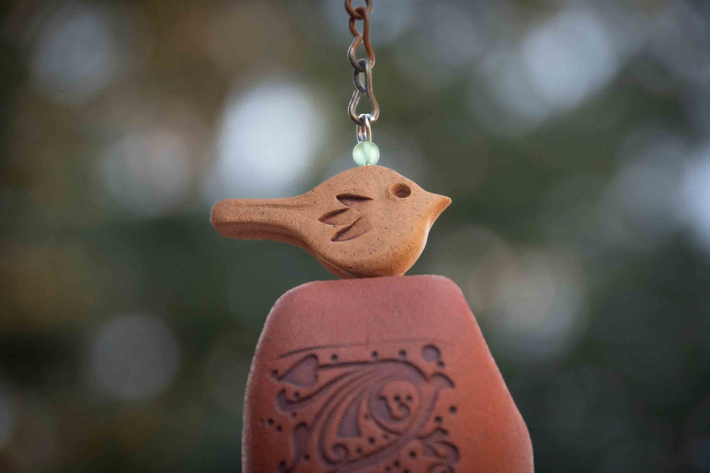 Rustic tan bird wind chime with copper sail, sympathy memorial gift