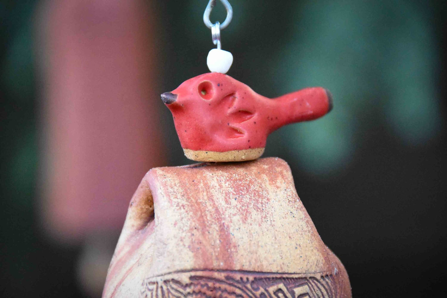 Glazed red bird bereavement wind chime – handcrafted sympathy garden decor.