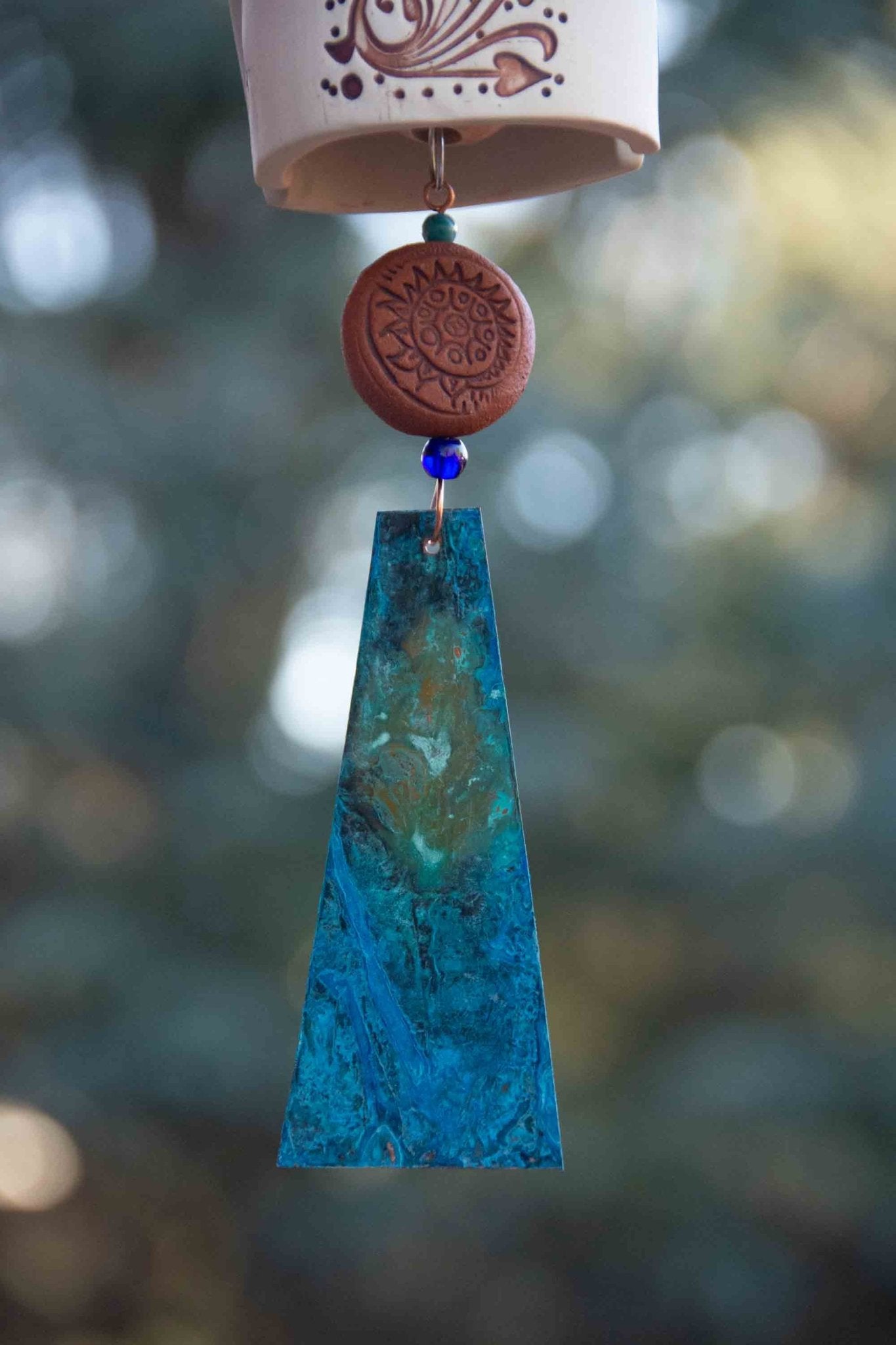 Rustic red bead and bird accent on handmade anniversary pottery wind chime