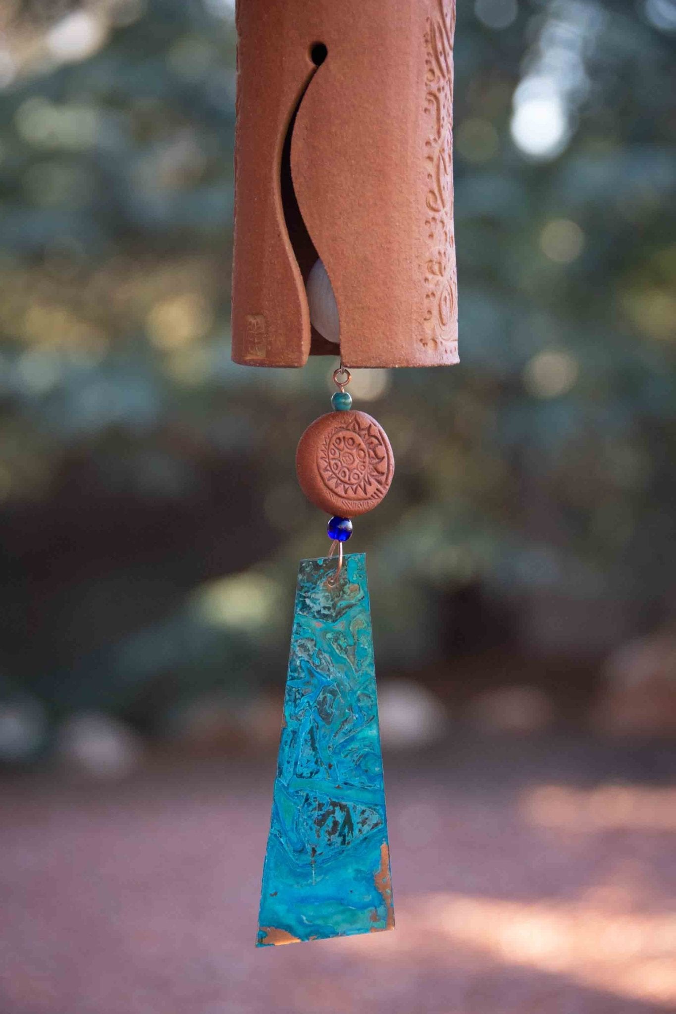 Garden wind chime crafted from stoneware clay for 9th anniversary gift