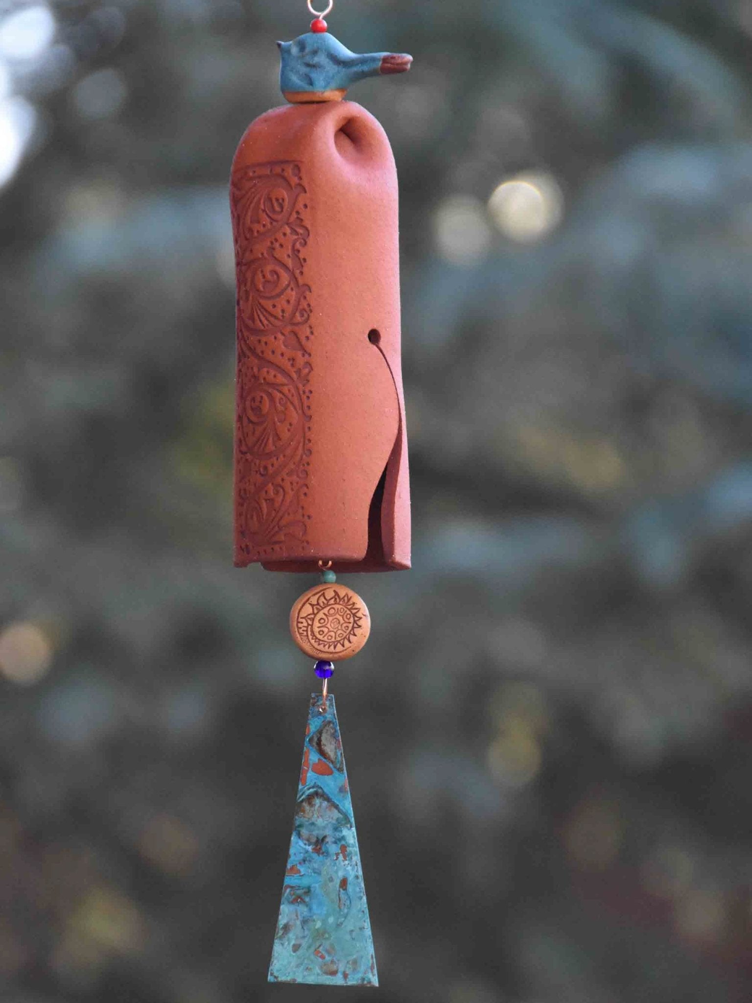 Symbolic pottery wind chime celebrating nine years of marriage