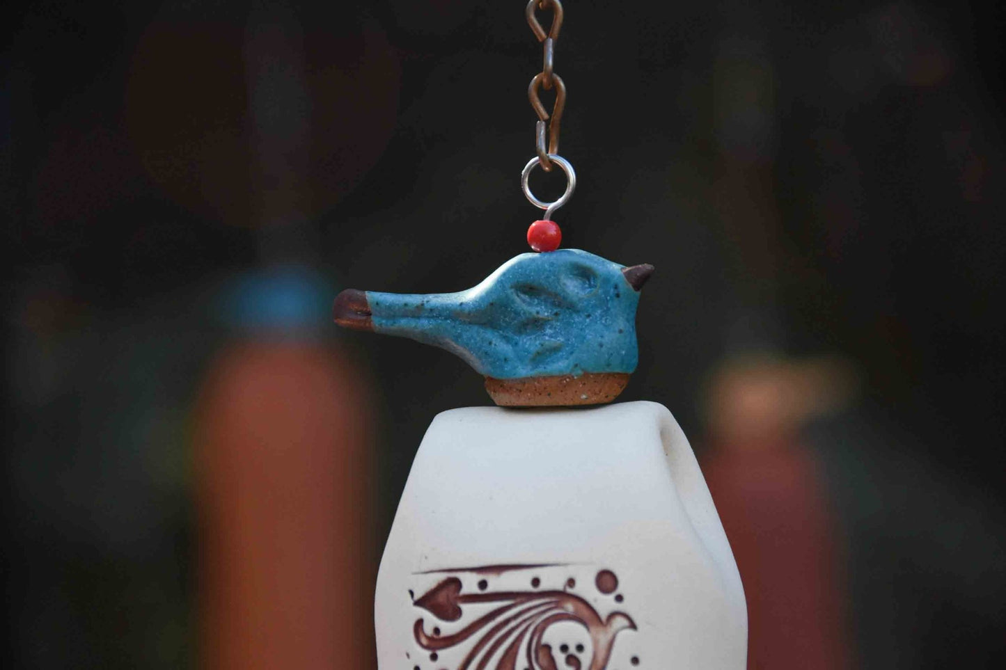 Rustic pottery wind chime as a unique 9th wedding anniversary keepsake