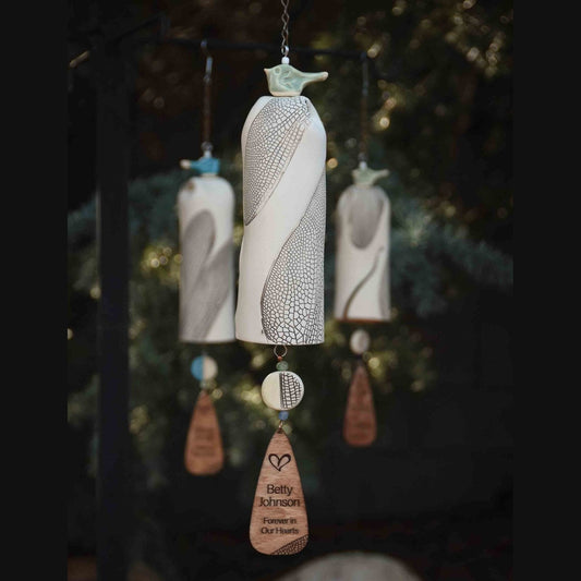 Handmade ceramic sympathy wind chime with dragonfly motif and bird topper