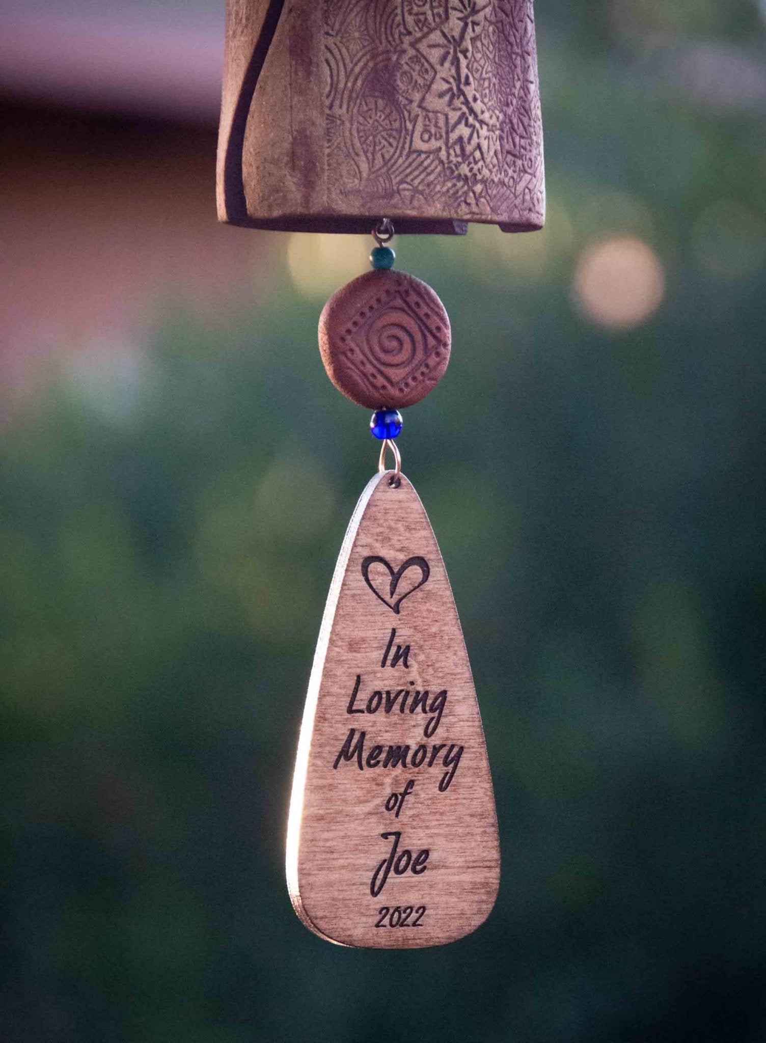 Pet loss ceramic wind chime with paw bead and memorial message