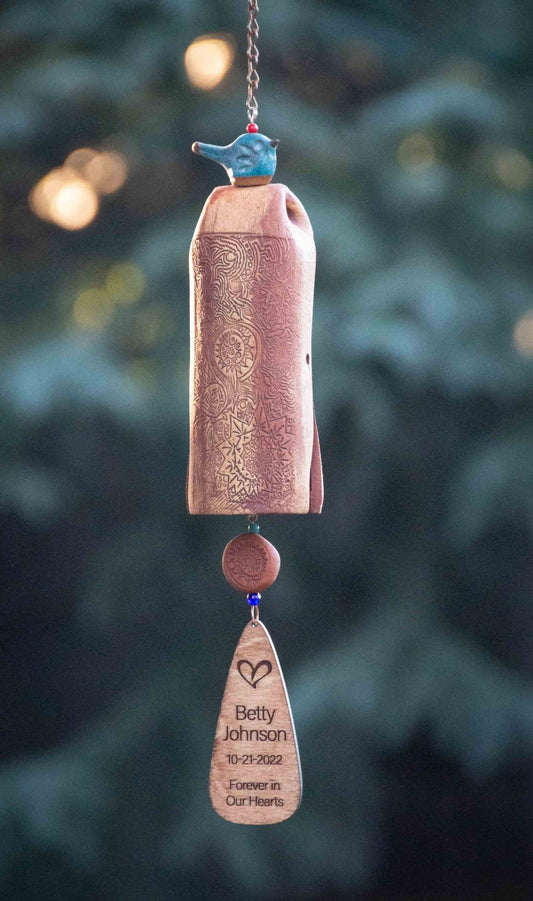 Rustic tan memorial wind chime with custom wooden sail inscription