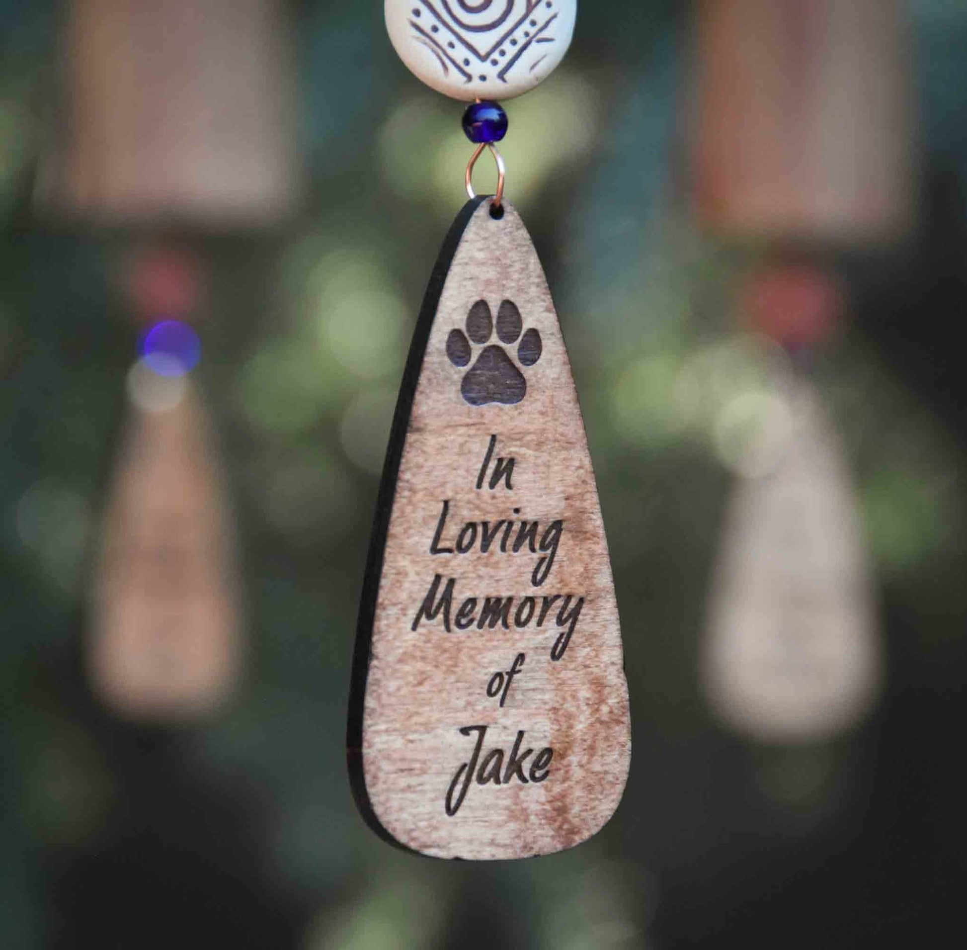 Personalized pet memorial wind chime with paw print wooden wind sail