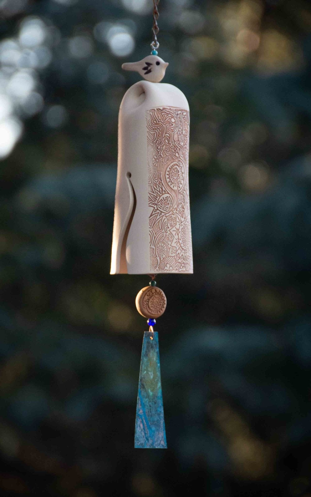 Handcrafted ceramic wind chimes by EarthWind Bells for gardens, patios, and memorial gifts