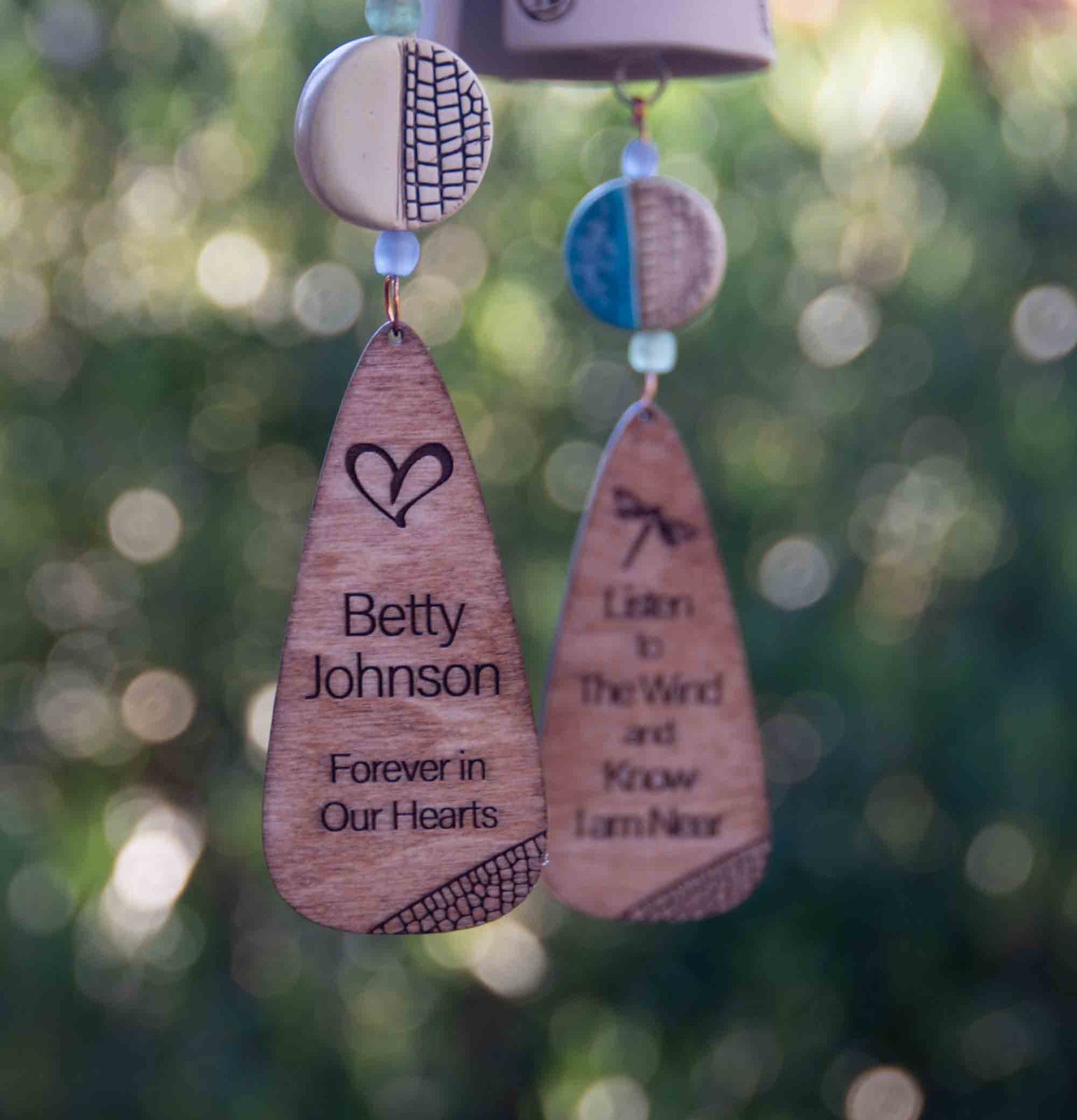 Personalized memorial wind chimes with custom inscriptions, handmade sympathy gifts